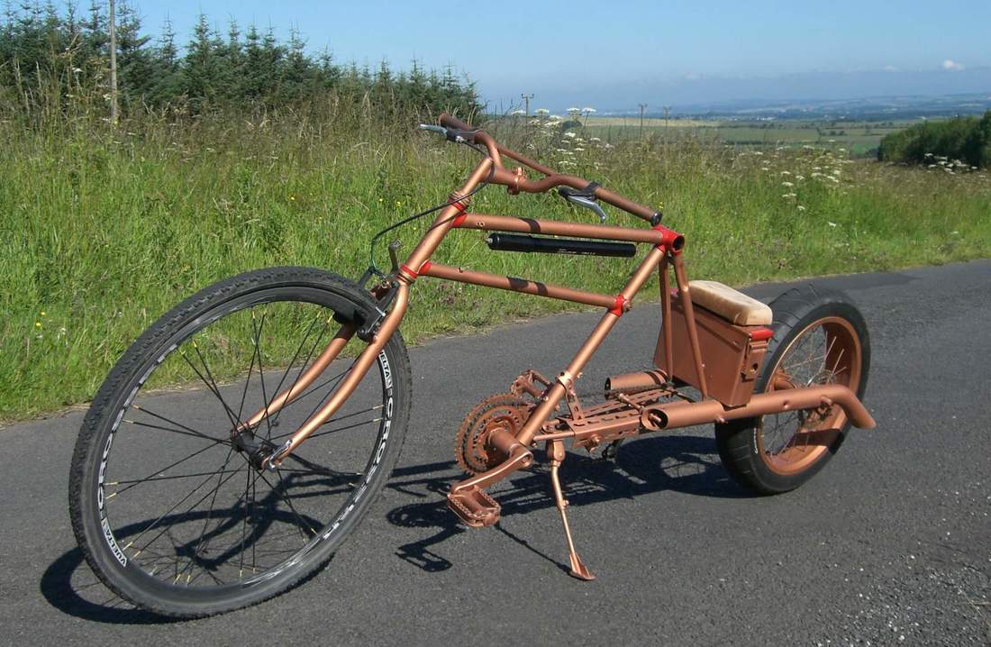 1953 BSA steel frame inverted and stretched to create lowrider cruiser. very fast & stable at high speeds.