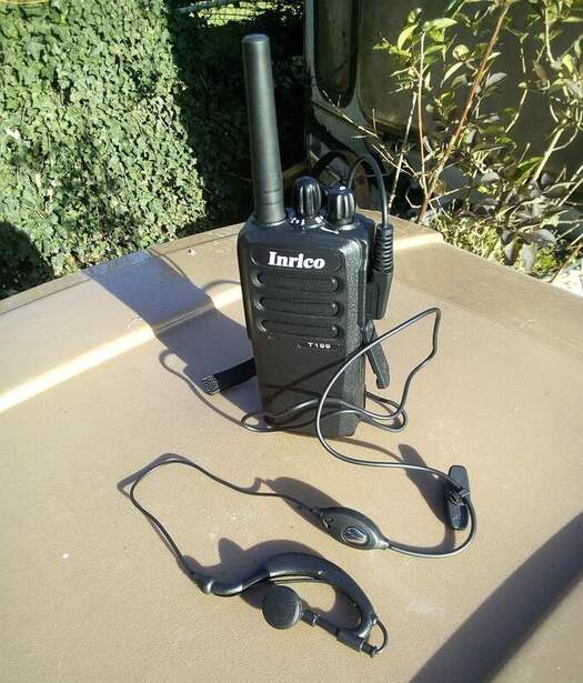 Inrico T-199 16channel screenless network radio with high gain antenna and wired earpiece. This has been waterproofed and works very well when out /P in the hills.