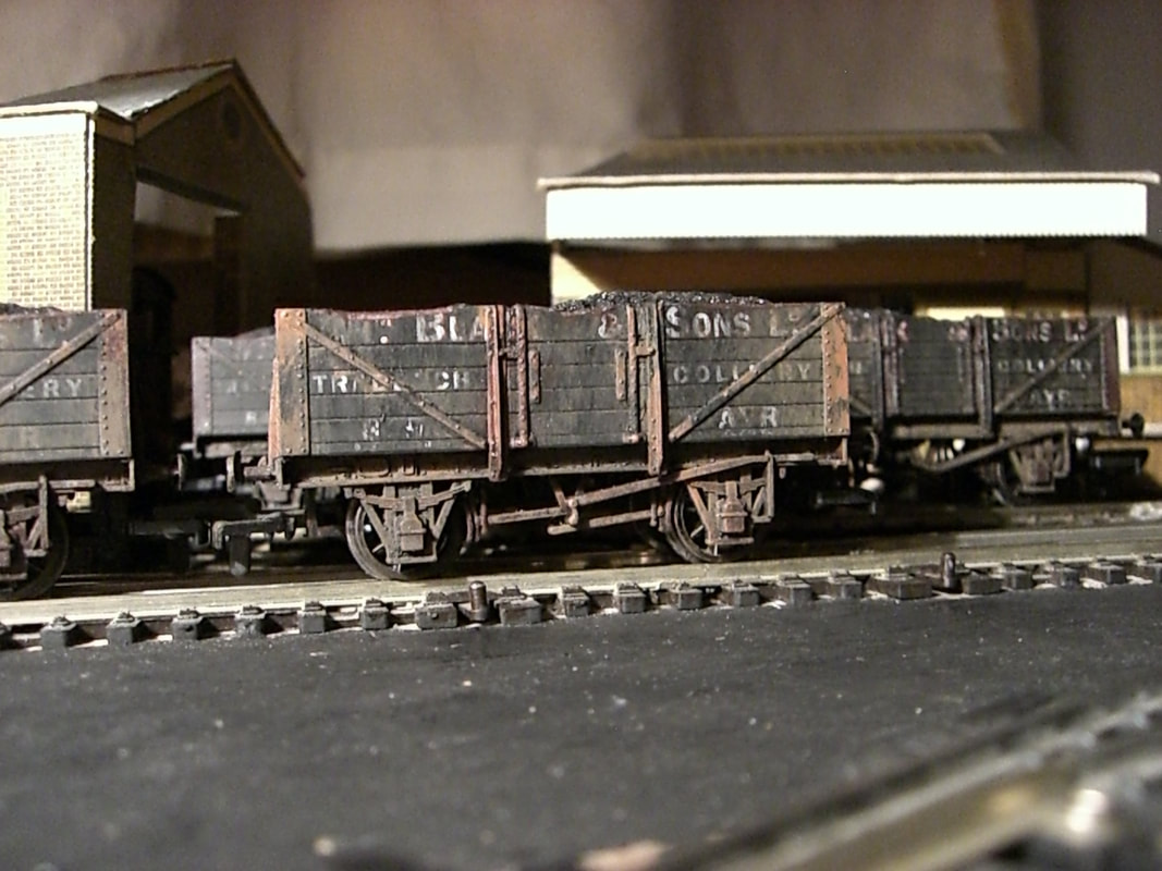 Coal wagons during weathering process . 4mm 'OO' scale.